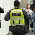 a security officer walking down a street